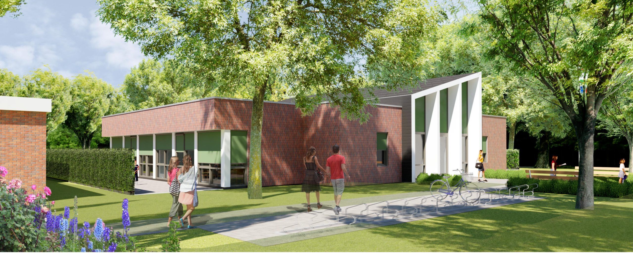 Impressie OBS de Zandplaat school met groen grasveld en kinderen