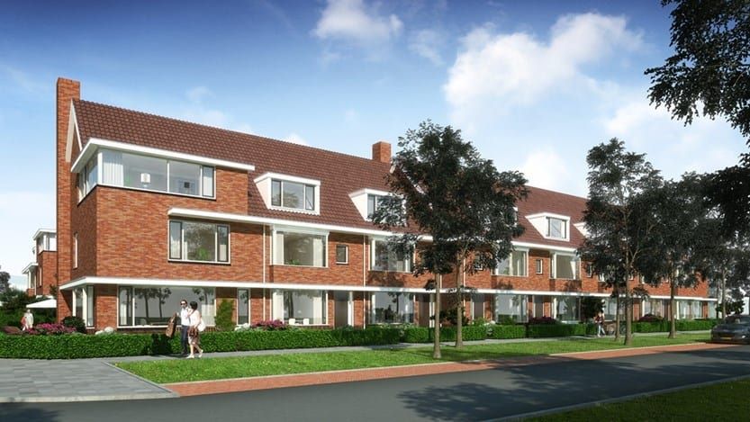Rijtjeshuizen in een nieuwbouwwijk met groen en bomen