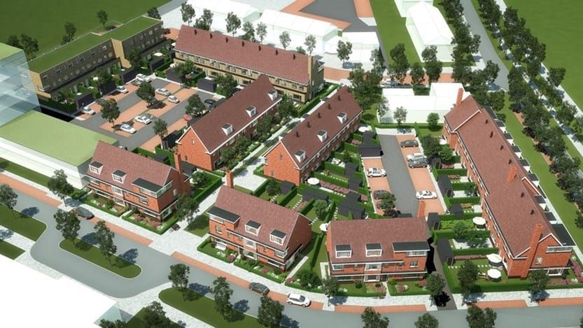 Nieuwbouwwijk van boven met veel groen en bomen